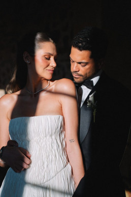 International couple posing in Japan during their wedding, alongside their wedding videographer.