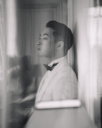 Japanese couple laughing together during cherry blossom pre wedding photo session