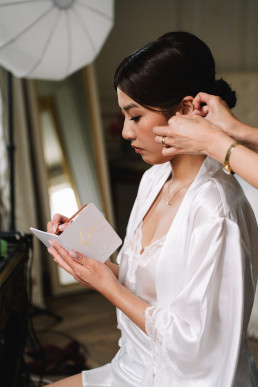 Japanese newlyweds walking together through Kyoto street during couple session