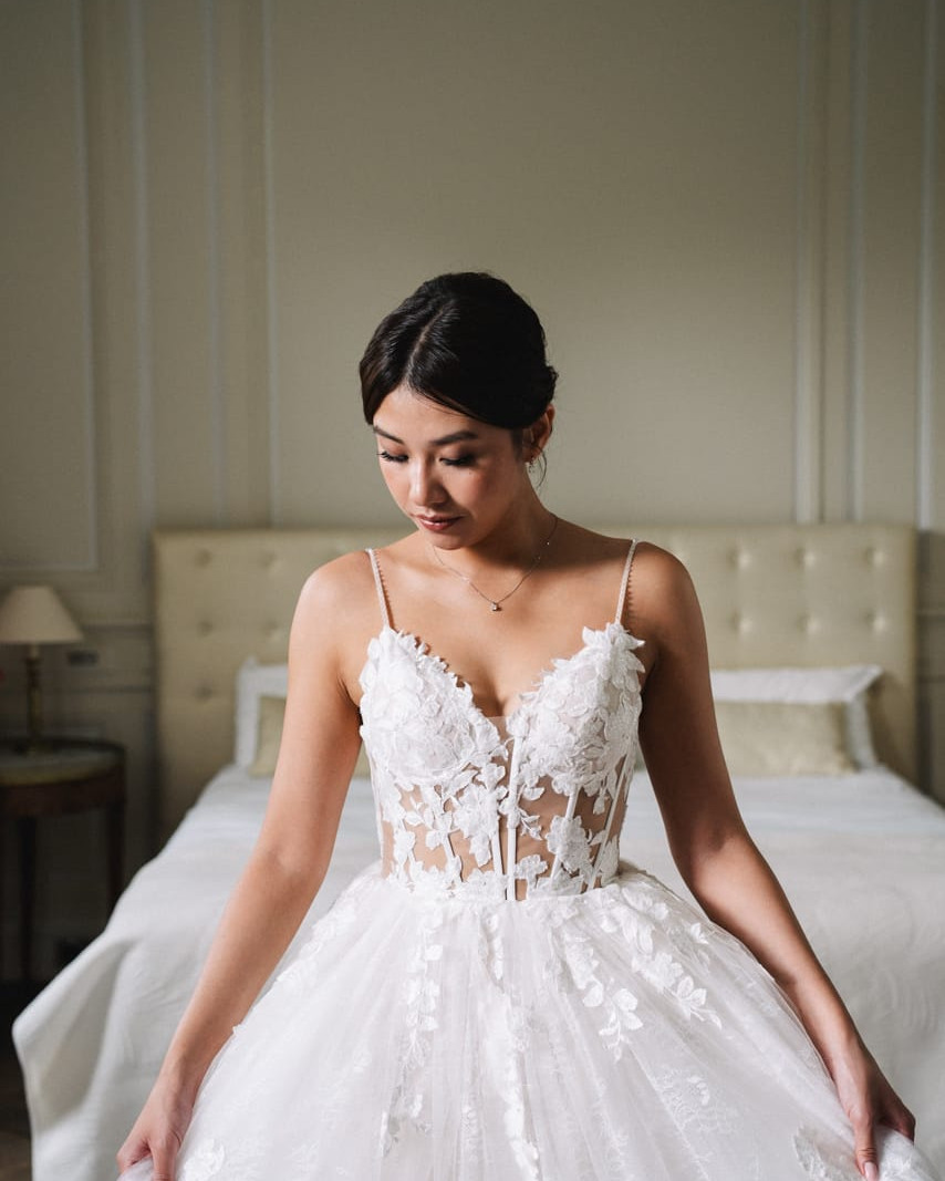 Japanese bride finalizing hair and makeup before ceremony in luxury wedding venue