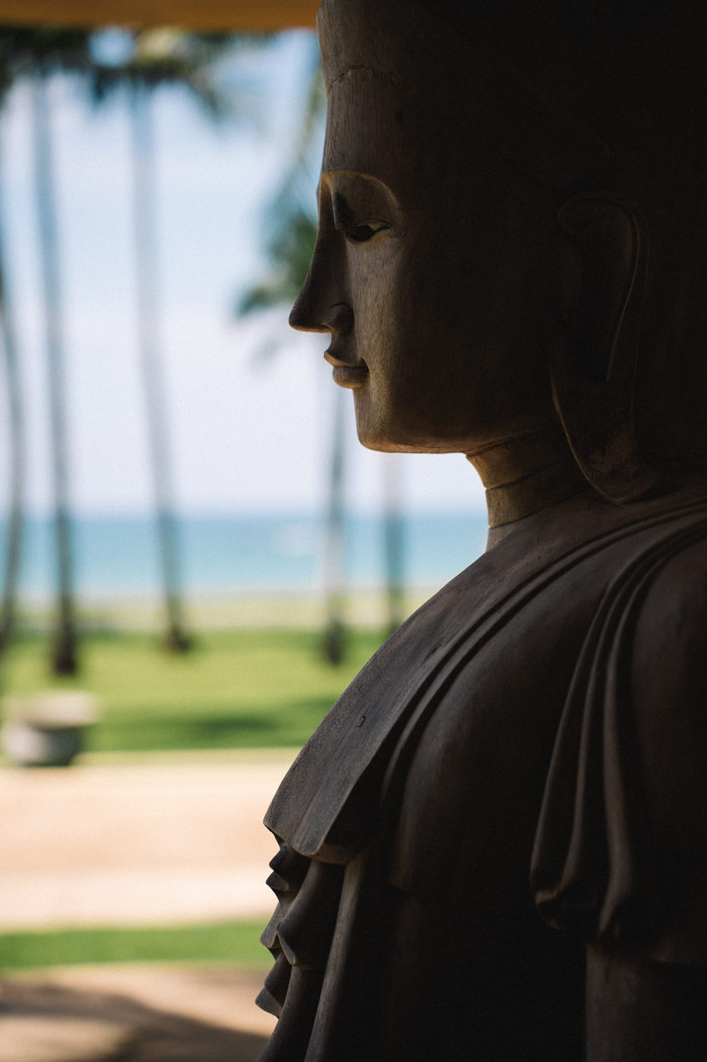 Portrait of bride looking toward the ocean light before the ceremony