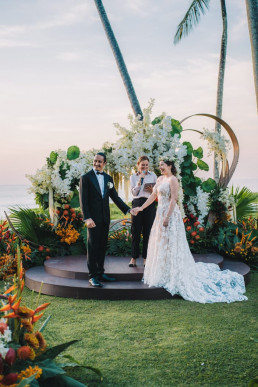 An amazing wedding ceremony by the beach in Phuket shot by a destination wedding videographer