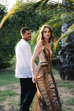 Elegant elopement wedding couple portrait in a tropical garden