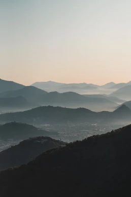 Rolling hills of Tuscany creating the iconic landscape for a luxury destination wedding in Italy.