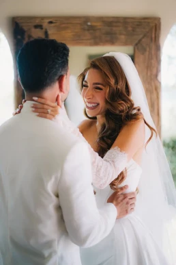 Smiling bride embracing the groom during their elopement in Chiang Mai, Thailand