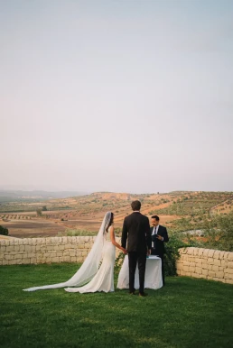 Bride and groom overlooking the countryside after their elopement in France
