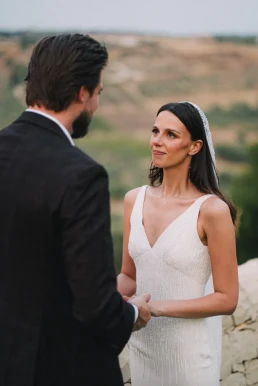 Bride exchanging vows with the groom during an intimate ceremony on the French Riviera