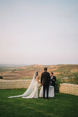 Bride and groom overlooking the Italian countryside after their intimate wedding