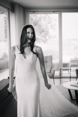 Bride laughing during a candid moment before the wedding ceremony